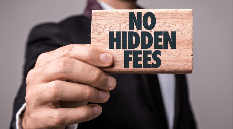 Man holding a sign saying "No Hidden Fees"